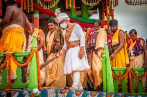 Gajapati Divyasingha Deva doing Chera Pahara, during Rath Ratha Yatra